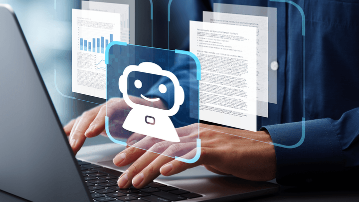 hand typing on laptop with robot icon hovering over