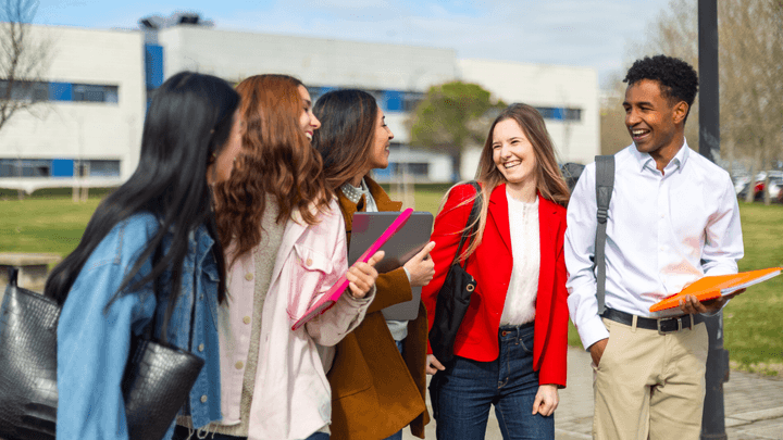 Job-ready students smiling on a campus